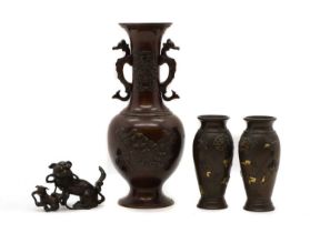 A group of Japanese plum bronze vases