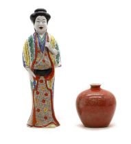 A Japanese porcelain figure,