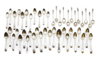 A collection of silver spoons,