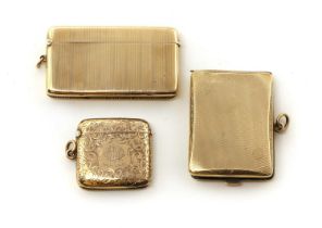 A group of three 9ct gold vesta cases