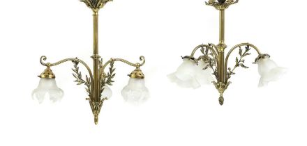 A Edwardian three light brass and frosted glass chandelier