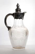 A silver mounted cut-glass claret jug