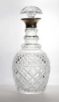A silver mounted cut-glass decanter,