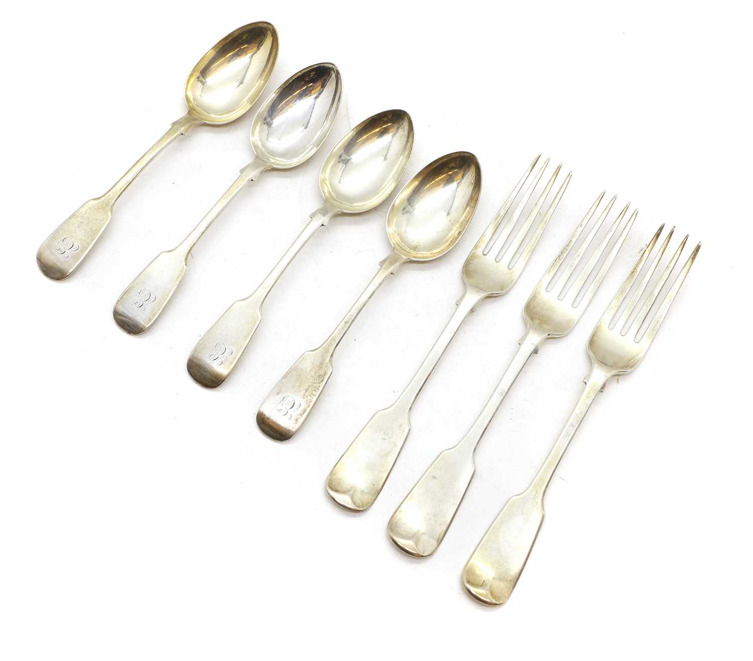 A collection of silver flatware