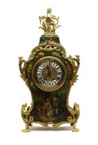 A Louis XV style painted wood mantel clock