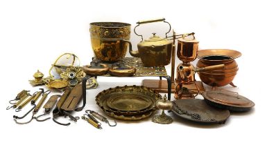 A collection of brass and copper wares