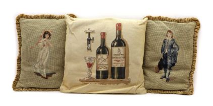 A group of three needlework cushions,