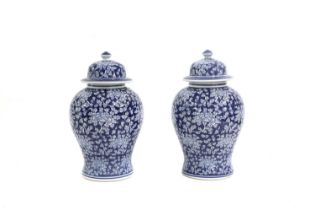 A pair of blue and white porcelain ginger jars