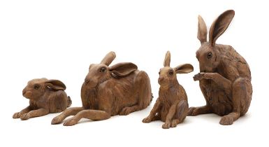 A group of four pottery hares