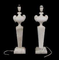 A pair of alabaster lamps