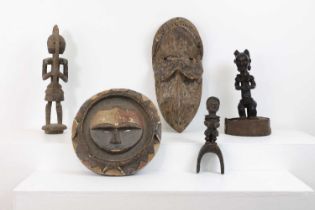 A group of five tribal wood carvings