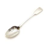 A Victorian silver serving spoon