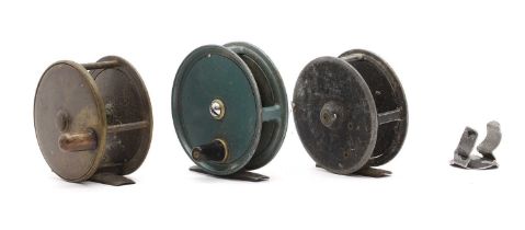 A group of three fly fishing reels