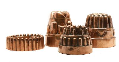 A group of four Victorian copper jelly moulds