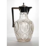 A late Victorian silver mounted cut-glass claret jug