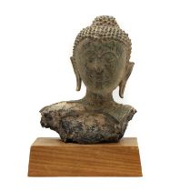 A bronze Buddha head,