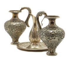 A silver ewer and basin