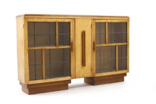 An Art Deco maple and oak low cabinet,