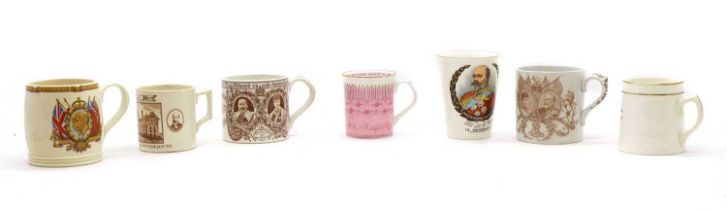 A group of commemorative pottery mugs