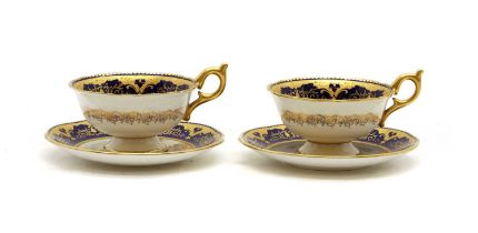 Two sets of Coalport porcelain cups and saucers