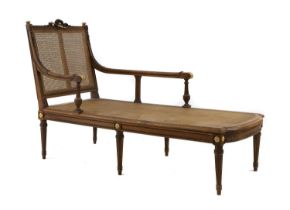 A mahogany chaise longue,