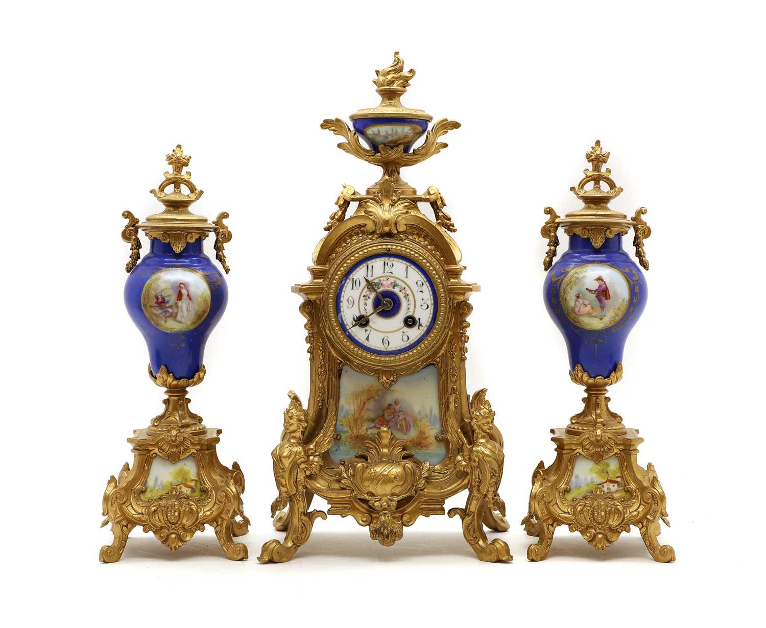 A ormolu and porcelain mantel clock garniture