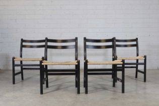 A set of four Danish 'CH47' ebonised oak chairs,