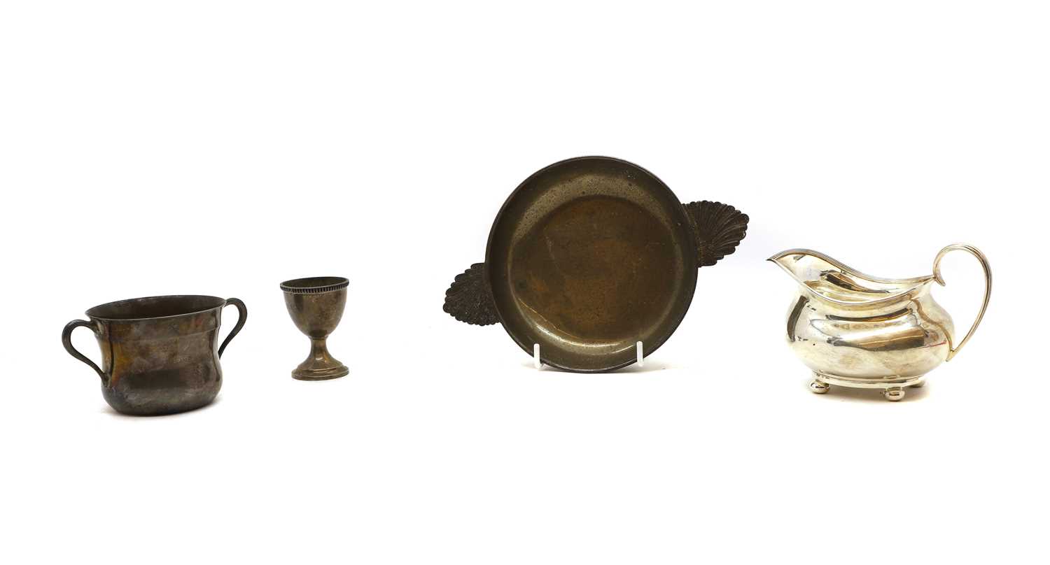 A group of silver items