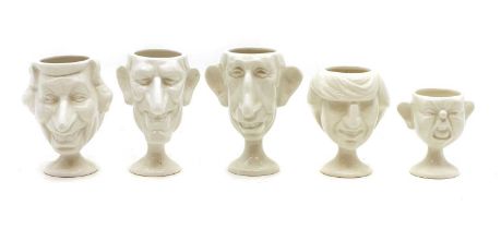 A group Luck & Flaw Spitting Image pottery egg cups