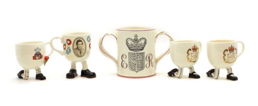 A group of Carlton ware commemorative walking mugs