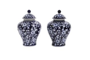 A pair of blue and white porcelain ginger jars,