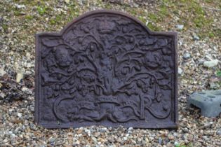 A cast iron fireback