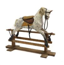 A Victorian dapple grey rocking horse