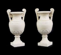 A pair of large porcelain urns,