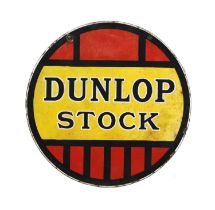 A 'Dunlop Stock' enamel sign