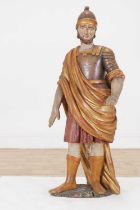 A polychrome-painted pine figure of a Roman soldier,