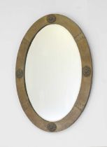 An Arts & Crafts brass mirror,