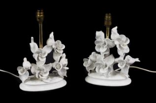 A pair of Blanc de Chine style porcelain table lamps