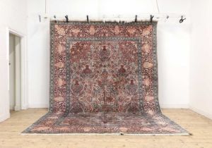 A wool and silk carpet