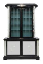 An Art Deco Hollywood Regency ebonised bookcase,