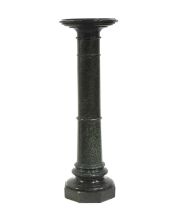 A serpentine green marble column