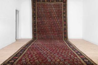 A large Persian Bidjar wool runner,