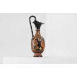 An Apulian red-figure trefoil oinochoe, attributed to the painter of the Macinagrossa Stand,