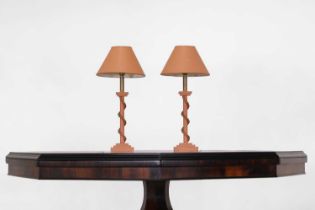 A pair of painted wooden table lamps,