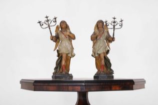 A pair of Renaissance carved giltwood and polychrome angels,