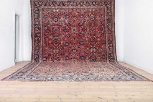 A Persian wool carpet,