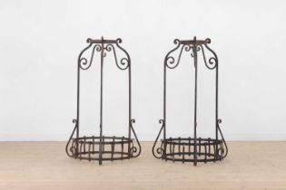 A pair of wrought-iron jardinière frames,