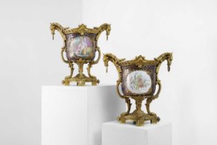 A pair of Sèvres-style ormolu-mounted porcelain cachepots,
