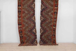 An opposing pair of kilim flat-weave runners,