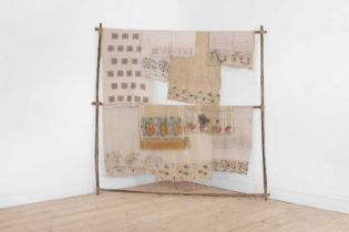 A group of embroidered towels and fragments,